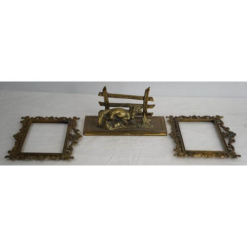 363 - A vintage brass letter rack of a fox and two brass frames.