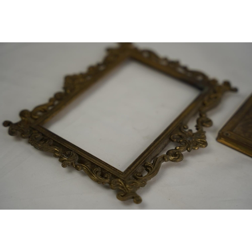 363 - A vintage brass letter rack of a fox and two brass frames.