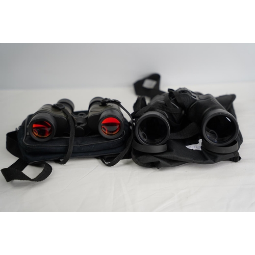 369 - A pair of 8-24x50 zoom field glasses and 7 x 35.