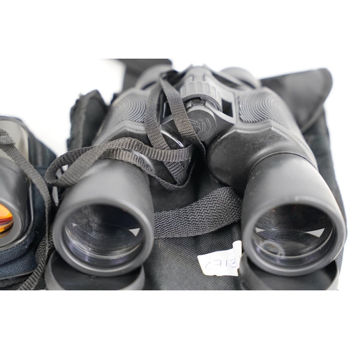 369 - A pair of 8-24x50 zoom field glasses and 7 x 35.