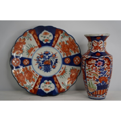 389 - An Imari vase and plate.