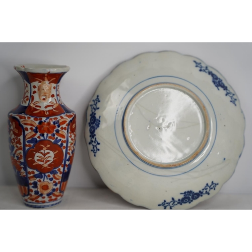 389 - An Imari vase and plate.