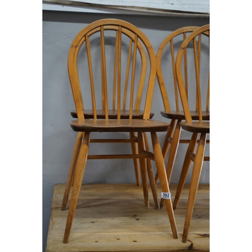 392 - A set of 4 vintage/ Mid Century Ercol dining chairs.