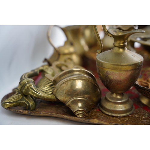 400 - A decorative wood and painted tray and a collection of brass ware.