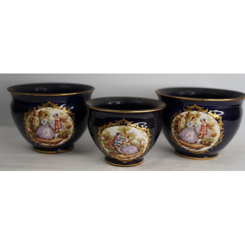 414 - A set of three Limoge style patterned plant pots.