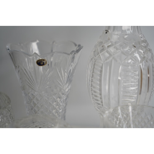 420 - A Waterford crystal bud vase, a crystal table lamp base and other presentation bowls.