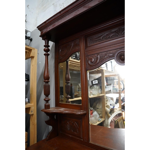 424 - An antique mahogany sideboard/dresser with bevelled glass mirror panels.