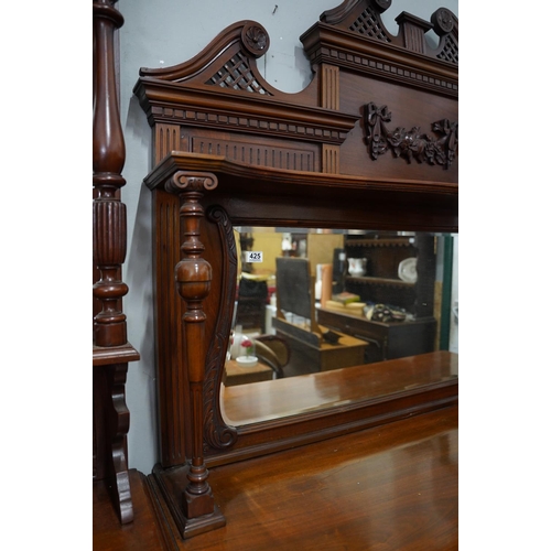 425 - A stunning antique mahogany sideboard with bevelled glass mirror panel and gallery shelf.