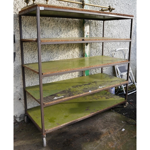 429 - A large industrial style four shelf trolley on casters.