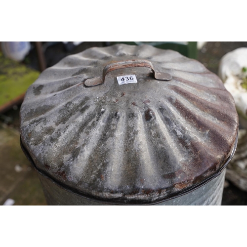 436 - A vintage galvanised dust bin and lid.