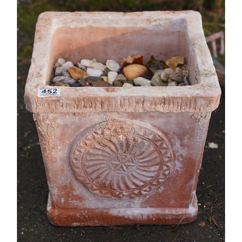 452 - A large square terracotta plant pot.