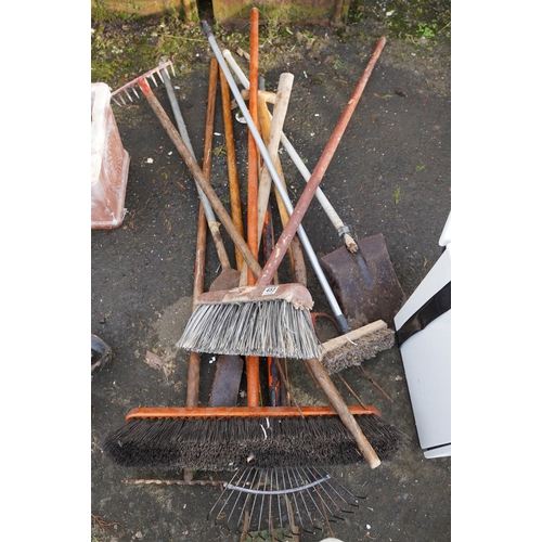 453 - A large yard brush and a lot of assorted gardening tools and more.