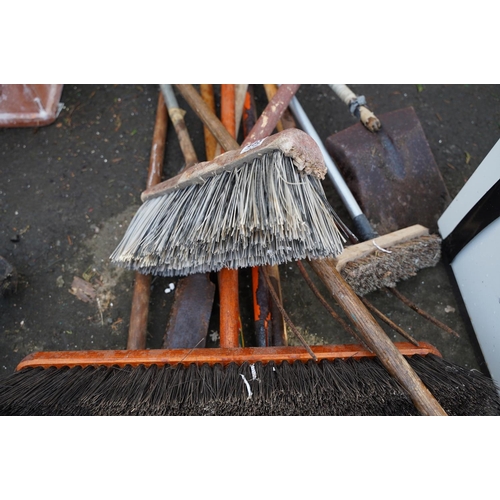 453 - A large yard brush and a lot of assorted gardening tools and more.