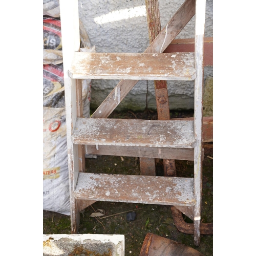 471 - A wooden step ladder.