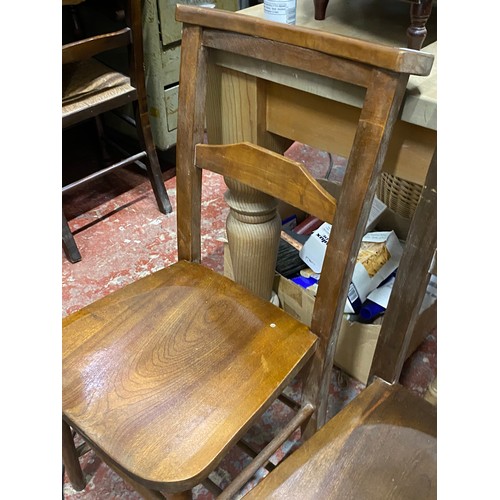 233 - A pair of vintage church chairs (a/f).