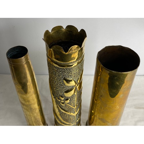 50 - A collection of 3  antique brass Trench art shell casings, to include a stunning decorative piece an... 