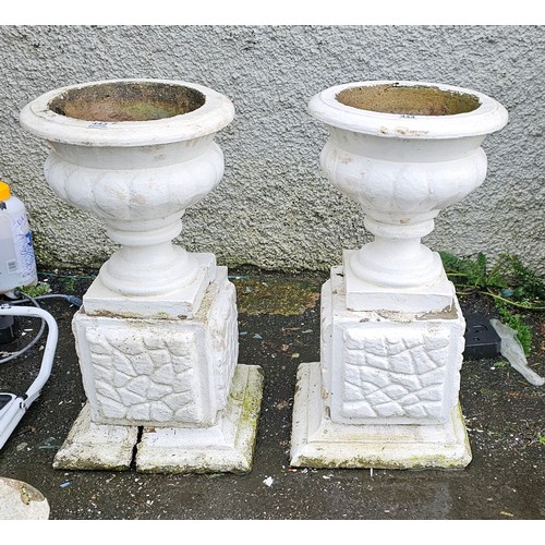 443 - A stunning pair of decorative antique style garden urn planters on raised bases (1 base a/f)