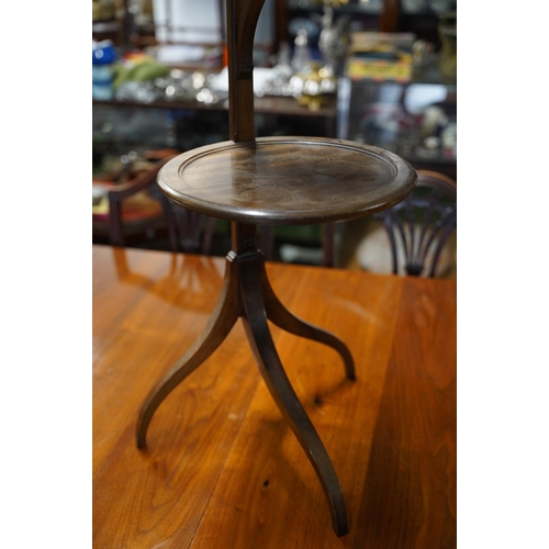 119 - A mahogany three tier cakestand with flat back.