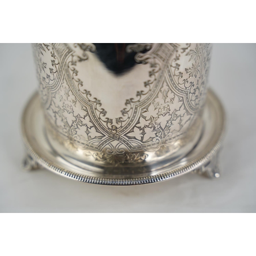 120 - A decorative silver plated biscuit barrel on a footed stand.