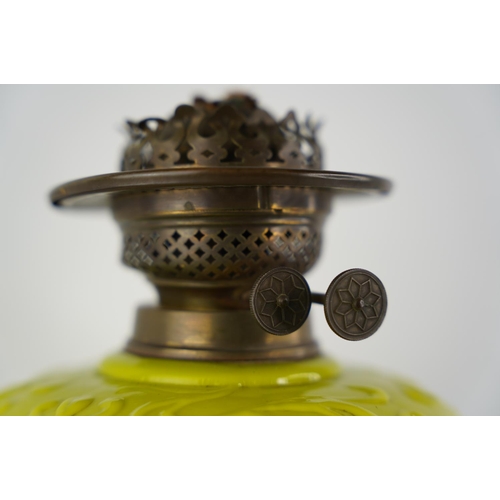 123 - A stunning antique lime green font oil lamp.