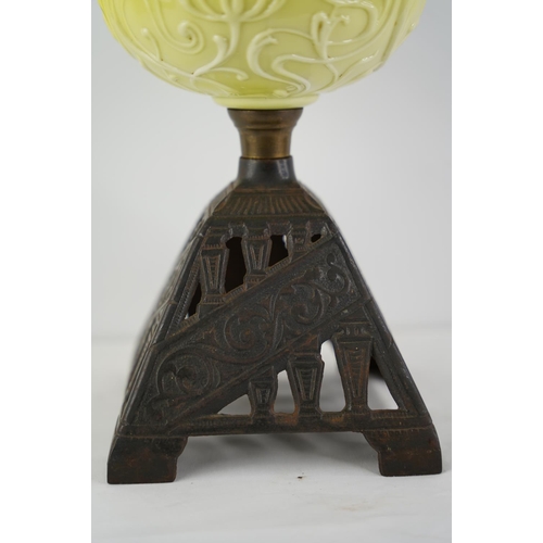 123 - A stunning antique lime green font oil lamp.