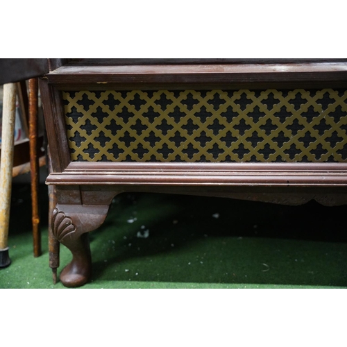 124 - An inlaid walnut style two door drinks/television cabinet with grill panel.