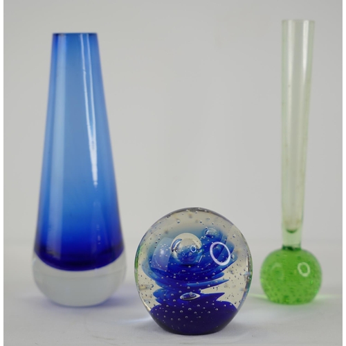 14 - A vintage blue glass paperweight and two glass bud vases.