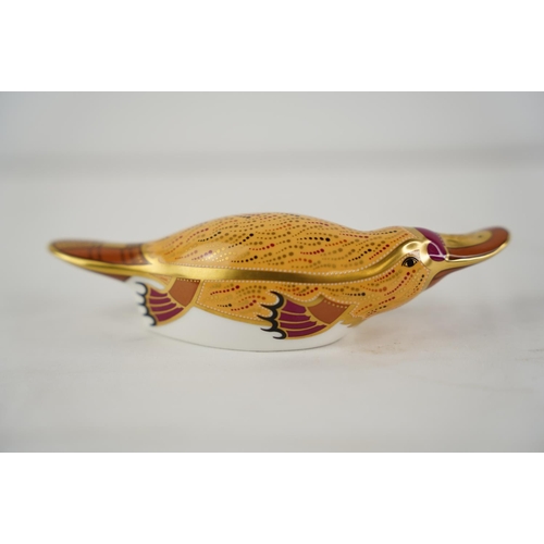 146 - A Royal Crown Derby 'Platypus' paperweight, gold stopper.