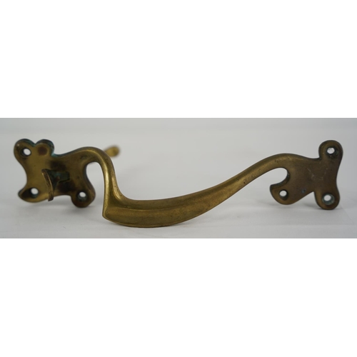 16 - A large antique/ Art Nouveau style brass door latch.