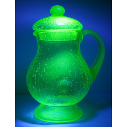 17 - A stunning Uranium glass pitcher and lid.