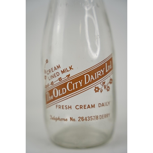 22 - A vintage glass creamery bottle 'The Old City Dairies Ltd' Derry.