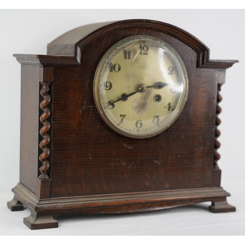 4 - A large vintage oak cased mantle clock.