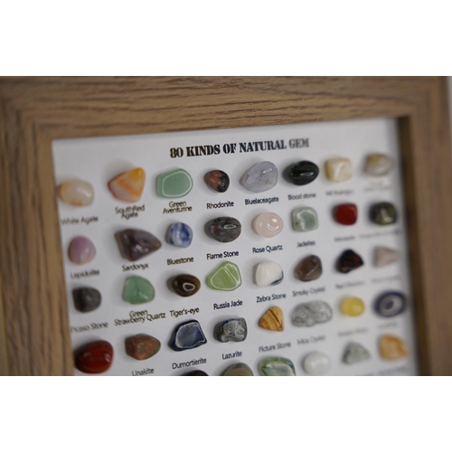 43 - A framed display of 80 Natural Gem stones.