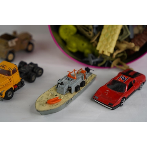 45 - A collection of vintage toy cars, plastic military figures to include Dinky Toys Motor Patrol Boat 6... 