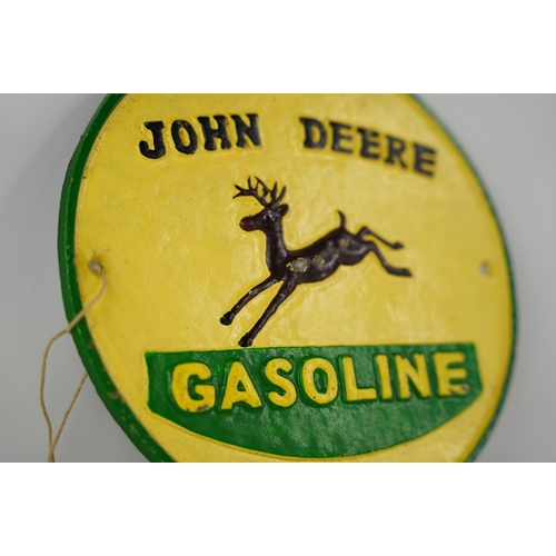 48 - A cast iron John Deere Gasoline sign.