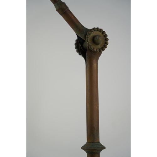 5 - An antique brass angle poise desk lamp.