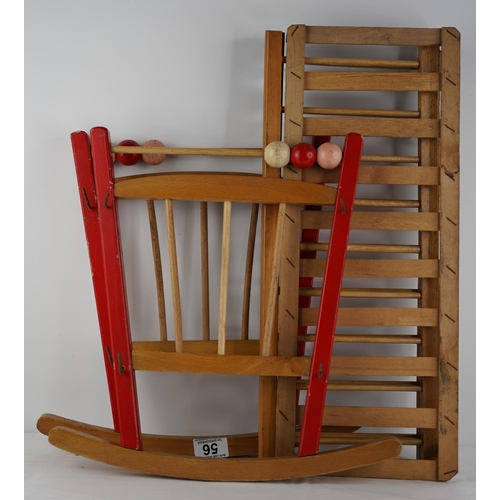 56 - A vintage child's toy cradle.