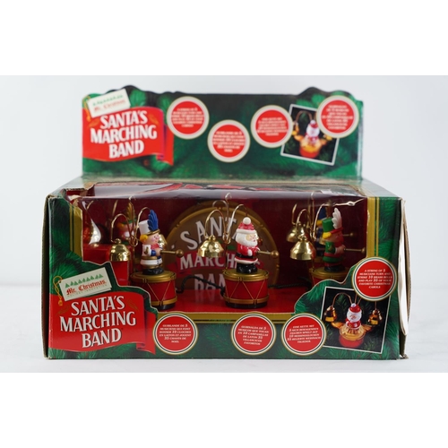 61 - A vintage boxed 'Santa Marching Band'.