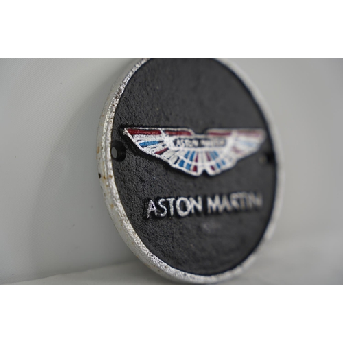 63 - A cast iron Aston Martin wall plaque.