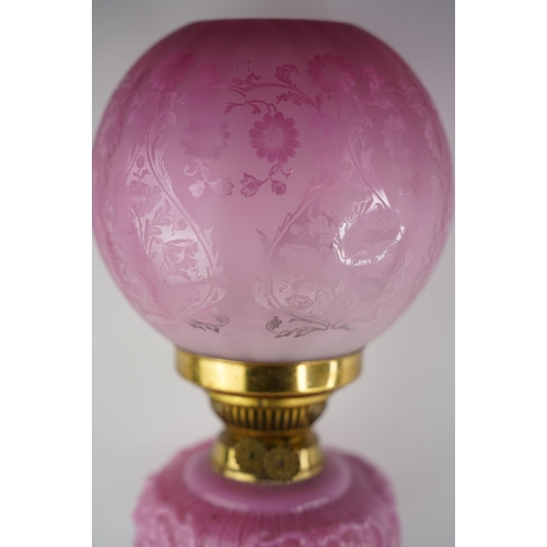 158 - A superb antique Corinthian pink glass font oil lamp with etched pink glass shade.