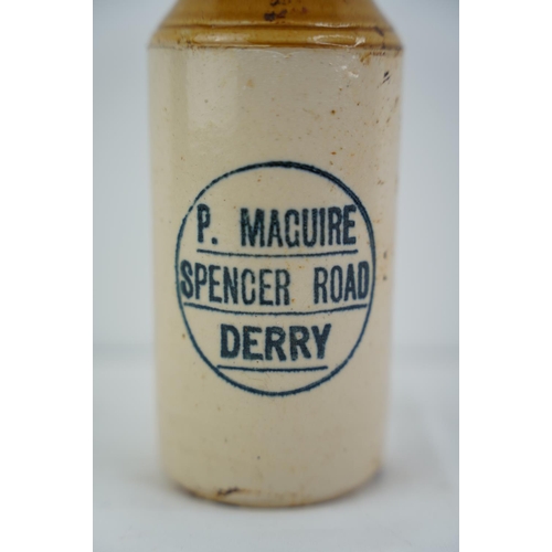 168 - An antique P Maguire, Spencer Road, Derry stoneware beer bottle.