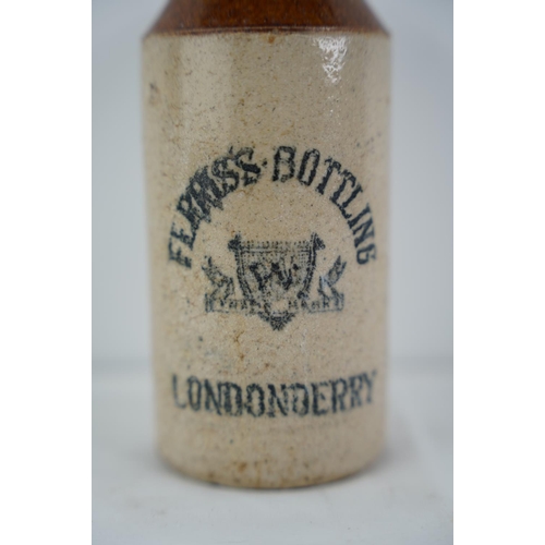 169 - An antique Ferris's Bottling, Londonderry stoneware beer bottle with error.