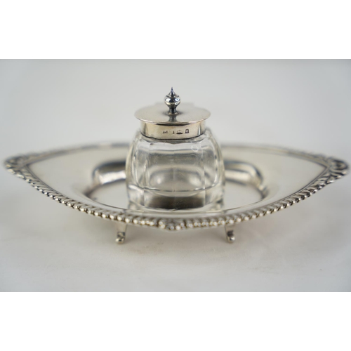 177 - A Sterling silver & glass inkwell, total weight 127g.