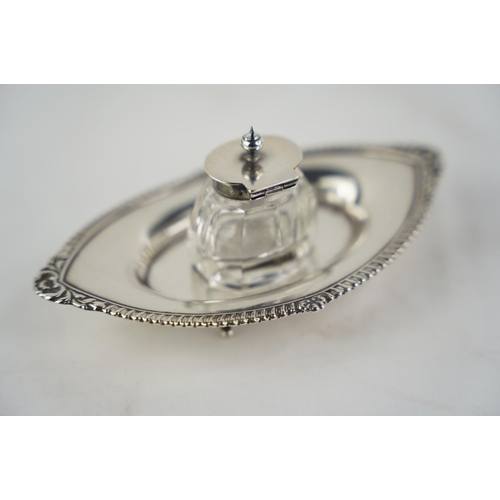 177 - A Sterling silver & glass inkwell, total weight 127g.