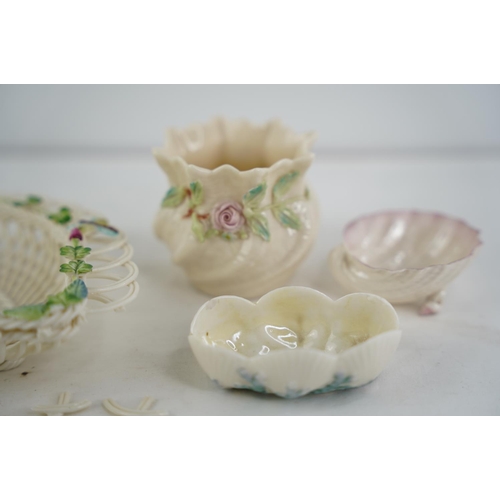 187 - Two Belleek pottery black stamp shell shaped dishes and another and a Belleek pottery four strand fl... 