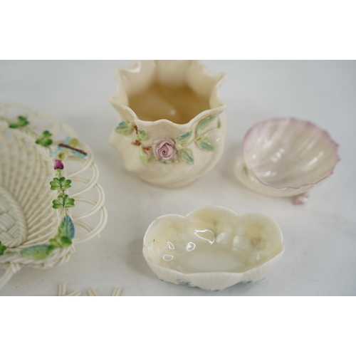 187 - Two Belleek pottery black stamp shell shaped dishes and another and a Belleek pottery four strand fl... 