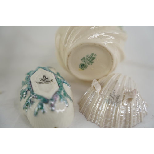 187 - Two Belleek pottery black stamp shell shaped dishes and another and a Belleek pottery four strand fl... 