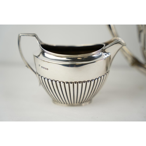 189 - A stunning antique/ Victorian Sterling silver three piece tea service, weighing 1064g.