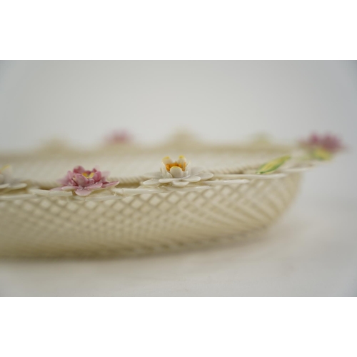 195 - A Belleek pottery limited edition three strand basket 'Lily Blossoms Basket' (a/f).