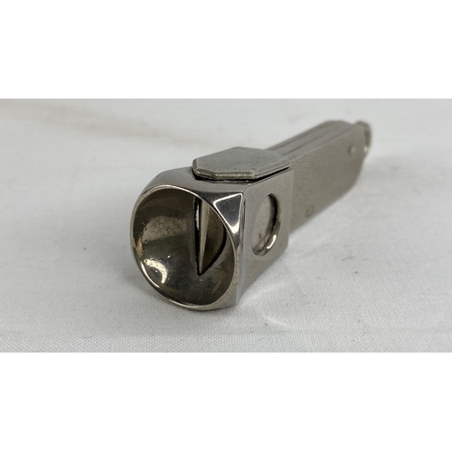 183 - A Sterling silver cigar cutter.